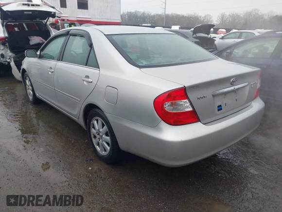 2004 Toyota Camry LE with VIN 4T1BF30K14U578385, listed as a IAAI auction lot 41547709 with 217,434 mi miles. Bid and sale history available at carsss.com. Image 3.