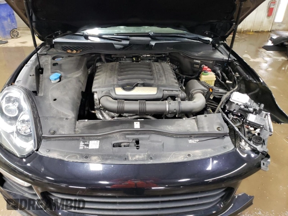 2016 Porsche Cayenne z VIN WP1AA2A20GLA05428, wystawiony jako Copart lot #52168225 z przebiegiem 90 749 mil mil oraz Szkoda całkowita • Salvage title. Historia ofert i sprzedaży dostępna na DreamBid. Obrazek 11.