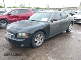 2008 Dodge Charger R/T with VIN 2B3KA53H58H188379, listed as a IAAI auction lot 41895792 with 136,442 mi miles and . Bid and sale history available at carsss.com. Image 2.