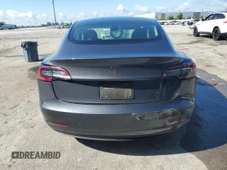 2023 Tesla Model 3 with VIN 5YJ3E1EA7PF456613, listed as a Copart auction lot 56940255 with 35,920 mi miles and Non repairable. Bid and sale history available at DreamBid. Image 6.