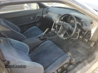 1992 Nissan Skyline z VIN HNR32035831, wystawiony jako Copart lot #74228974 z przebiegiem 49 082 mil mil oraz Szkoda całkowita • Salvage title. Historia ofert i sprzedaży dostępna na DreamBid. Obrazek 8.