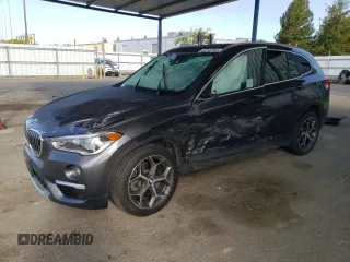 2017 BMW X1 sDrive28i with VIN WBXHU7C34HP924730, listed as a Copart auction lot 52245005 with 0 mi miles and Salvage Title. Bid and sale history available at carsss.com. Image 1.
