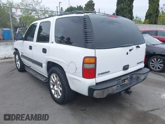 2002 Chevrolet Tahoe LS with VIN 1GNEC13T82R290051, listed as a IAAI auction lot 42058431 with 168,264 mi miles and . Bid and sale history available at DreamBid. Image 3.