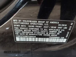 2015 Volkswagen Passat SEL Premium z VIN 1VWCV7A39FC088048, wystawiony jako IAAI lot #41896215 z przebiegiem 94 635 mil mil oraz . Historia ofert i sprzedaży dostępna na DreamBid. Obrazek 9.