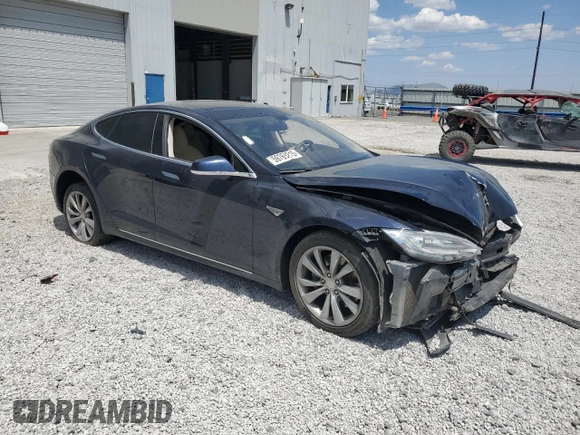 2014 Tesla Model S 60 with VIN 5YJSA1S12EFP29885, listed as a Copart auction lot 59769215 with Not provided miles and Salvage title. Bid and sale history available at DreamBid. Image 4.