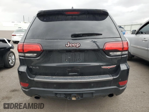 2017 Jeep Grand Cherokee Trailhawk with VIN 1C4RJFLT5HC692439, listed as a Copart auction lot 81093534 with 135,493 mi miles and Salvage title. Bid and sale history available at DreamBid. Image 6.