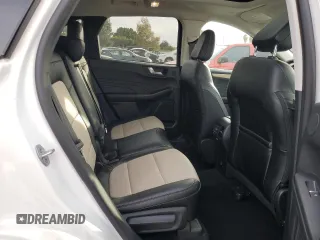 2022 Ford Escape Titanium Plug-In Hybrid с VIN 1FMCU0LZ8NUB45858, выставлен на аукционе Copart как лот 84727544 с пробегом 8 612 миль миль и Списание • Salvage title. История ставок и продаж доступна на DreamBid. Изображение 11.