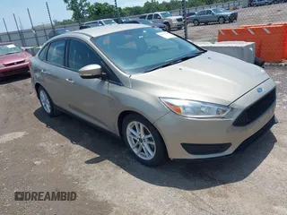 2016 Ford Focus SE z VIN 1FADP3F24GL365819, wystawiony jako IAAI lot #42549249 z przebiegiem 94 550 mil mil oraz . Historia ofert i sprzedaży dostępna na DreamBid. Obrazek 1.