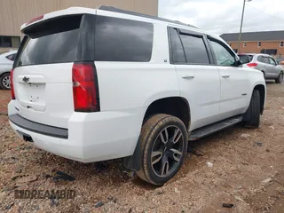 2018 Chevrolet Tahoe LT z VIN 1GNSKBKC9JR132670, wystawiony jako IAAI lot #42248273 z przebiegiem 136 636 mil mil oraz . Historia ofert i sprzedaży dostępna na DreamBid. Obrazek 4.