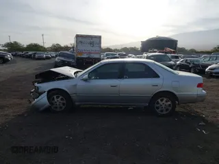 2000 Toyota Camry LE z VIN JT2BF28K6Y0282836, wystawiony jako IAAI lot #41799376 z przebiegiem 210 710 mil mil oraz . Historia ofert i sprzedaży dostępna na DreamBid. Obrazek 14.