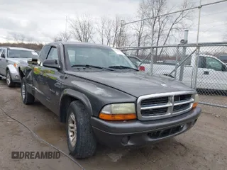 2002 Dodge Dakota with VIN 1B7GL12X22S644306, listed as a IAAI auction lot 41826999 with 198,069 mi miles and . Bid and sale history available at carsss.com. Image 1.