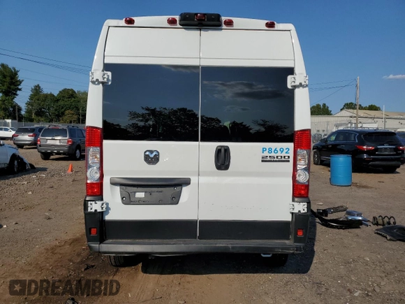2023 Ram ProMaster Cargo with VIN 3C6LRVDG8PE565077, listed as a Copart auction lot 71310694 with Not Provided miles and Salvage Title. Bid and sale history available at carsss.com. Image 6.