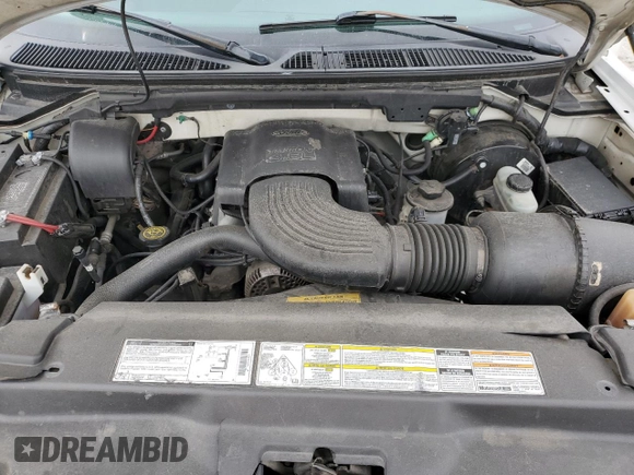 1999 Ford F-150 with VIN 2FTRX17W3XCA68816, listed as a Copart auction lot 53080755 with 201,501 mi miles and Salvage Title. Bid and sale history available at DreamBid. Image 12.