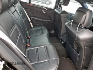 2014 Mercedes-Benz E with VIN WDDHF7GB2EA957450, listed as a Copart auction lot 51844615 with 111,405 mi miles and Salvage Title. Bid and sale history available at carsss.com. Image 10.