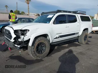 2019 Toyota Tacoma SR z VIN 3TMCZ5AN6KM284101, wystawiony jako IAAI lot #41099466 z przebiegiem 36 119 mil mil oraz . Historia ofert i sprzedaży dostępna na DreamBid. Obrazek 2.