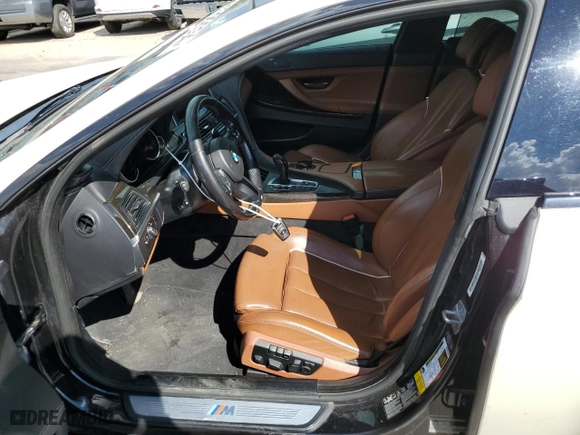 2015 BMW 6 Series 650i xDrive with VIN WBA6B4C55FD761396, listed as a Copart auction lot 61322034 with 138,024 mi miles and Clean Title. Bid and sale history available at carsss.com. Image 7.