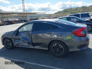 2016 Honda Civic Sedan LX with VIN 19XFC2F51GE034644, listed as a IAAI auction lot 41939884 with 59,433 mi miles. Bid and sale history available at carsss.com. Image 13.