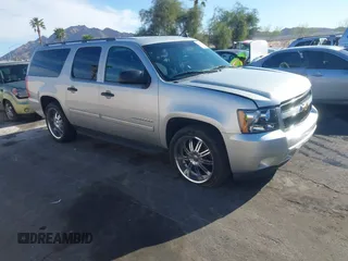 2010 Chevrolet Suburban LS with VIN 1GNUCHE02AR204383, listed as a IAAI auction lot 41891591 with 177,584 mi miles and . Bid and sale history available at DreamBid. Image 1.