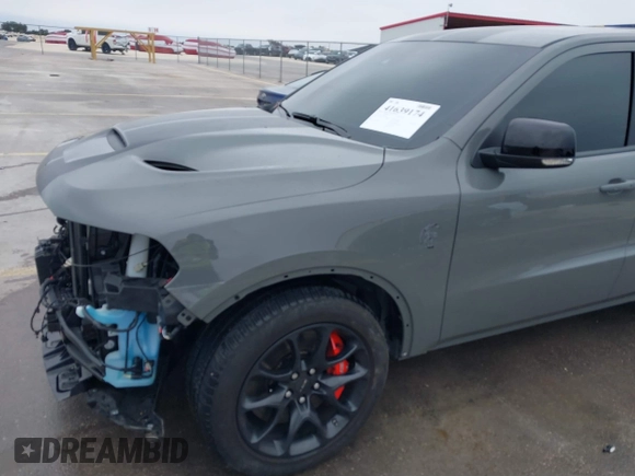 2021 Dodge Durango SRT Hellcat with VIN 1C4SDJH92MC605759, listed as a IAAI auction lot 41639174 with 4,800 mi miles and . Bid and sale history available at DreamBid. Image 19.