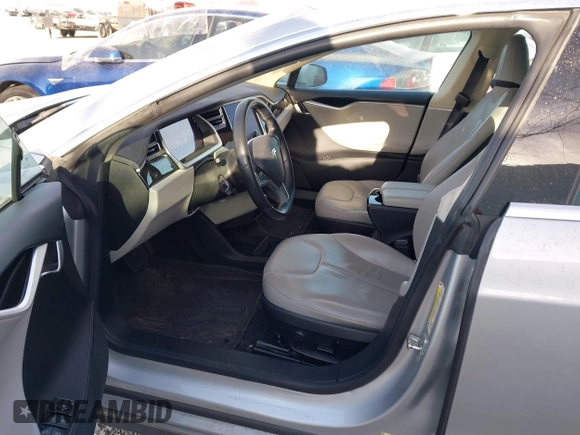2013 Tesla Model S with VIN 5YJSA1CG3DFP28908, listed as a IAAI auction lot 41804041 with 140,756 mi miles and . Bid and sale history available at DreamBid. Image 5.