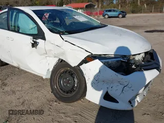 2019 Toyota Corolla L with VIN 5YFBURHEXKP934032, listed as a IAAI auction lot 41247557 with 95,560 mi miles. Bid and sale history available at carsss.com. Image 6.
