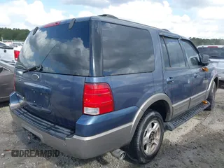 2003 Ford Expedition Eddie Bauer with VIN 1FMRU17W13LA53235, listed as a IAAI auction lot 40669736 with 317,399 mi miles. Bid and sale history available at carsss.com. Image 4.