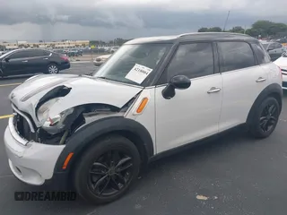 2012 MINI Countryman z VIN WMWZB3C56CWM04087, wystawiony jako IAAI lot #42180040 z przebiegiem 37 789 mil mil oraz . Historia ofert i sprzedaży dostępna na DreamBid. Obrazek 2.