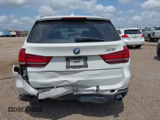 2015 BMW X5 xDrive35i z VIN 5UXKR0C57F0K62448, wystawiony jako IAAI lot #42321842 z przebiegiem 198 839 mil mil oraz . Historia ofert i sprzedaży dostępna na DreamBid. Obrazek 6.