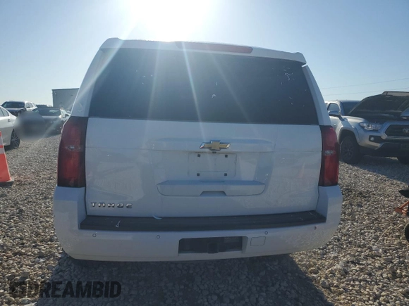 2015 Chevrolet Tahoe LS with VIN 1GNSCAKC8FR121612, listed as a Copart auction lot 56363785 with 239,214 mi miles and Salvage title. Bid and sale history available at DreamBid. Image 6.