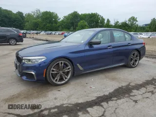 2018 BMW 5 Series M550i xDrive with VIN WBAJB9C54JB286187, listed as a Copart auction lot 54790535 with 59,743 mi miles and Salvage title. Bid and sale history available at DreamBid. Image 1.