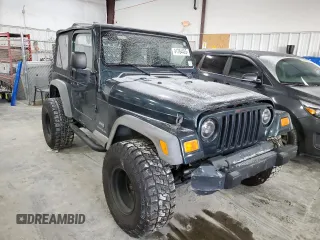 2006 Jeep Wrangler SE with VIN 1J4FA29S36P724699, listed as a Copart auction lot 41764425 with 129,016 mi miles and Salvage Title. Bid and sale history available at carsss.com. Image 4.