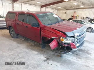 2021 GMC Canyon 4WD AT4 z VIN 1GTG6FEN7M1160316, wystawiony jako IAAI lot #42243333 z przebiegiem 58 366 mil mil oraz . Historia ofert i sprzedaży dostępna na DreamBid. Obrazek 1.
