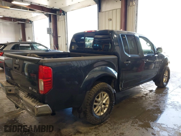 2015 Nissan Frontier Pro-4X with VIN 1N6AD0EV6FN735426, listed as a IAAI auction lot 42596253 with 183,493 mi miles and . Bid and sale history available at DreamBid. Image 4.