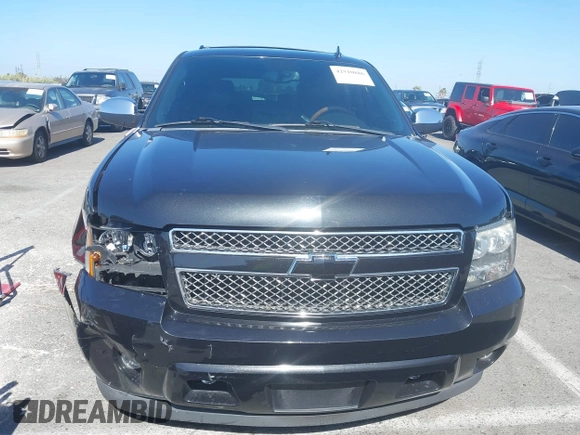 2013 Chevrolet Tahoe LT z VIN 1GNSCBE03DR174545, wystawiony jako IAAI lot #42510886 z przebiegiem 184 627 mil mil oraz . Historia ofert i sprzedaży dostępna na DreamBid. Obrazek 12.