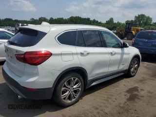 2017 BMW X1 xDrive28i with VIN WBXHT3Z3XH4A55624, listed as a Copart auction lot 59773545 with 140,251 mi miles and Salvage title. Bid and sale history available at DreamBid. Image 3.