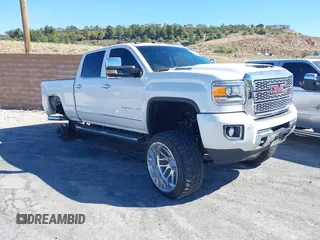 2018 GMC Sierra 2500HD Denali with VIN 1GT12UEY8JF287641, listed as a IAAI auction lot 42265327 with 102,391 mi miles and . Bid and sale history available at DreamBid. Image 1.