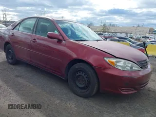 2004 Toyota Camry LE with VIN 4T1BE32K84U307551, listed as a IAAI auction lot 42054571 with 115,513 mi miles. Bid and sale history available at carsss.com. Image 1.