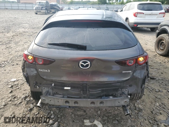 2019 Mazda 3 with VIN JM1BPAJMXK1119912, listed as a Copart auction lot 59708825 with 50,459 mi miles and Salvage title. Bid and sale history available at DreamBid. Image 6.