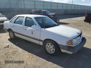 1986 Ford Tempo z VIN 1FABP22X4GK263512, wystawiony jako Copart lot #50618855 z przebiegiem 392 265 mil mil oraz Tytuł czysty. Historia ofert i sprzedaży dostępna na DreamBid. Obrazek 4.