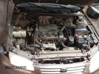 1999 Toyota Camry LE z VIN JT2BF28K7X0167855, wystawiony jako IAAI lot #41609230 z przebiegiem 242 398 mil mil oraz . Historia ofert i sprzedaży dostępna na DreamBid. Obrazek 10.