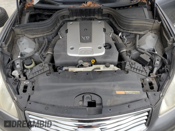 2012 Infiniti EX Journey z VIN JN1AJ0HR5CM450926, wystawiony jako Copart lot #46270335 z przebiegiem Nie podano mil oraz Szkoda całkowita • Salvage title. Historia ofert i sprzedaży dostępna na DreamBid. Obrazek 12.