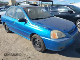 2003 Kia Rio with VIN KNADC125936239472, listed as a IAAI auction lot 41729536 with 156,421 mi miles. Bid and sale history available at carsss.com. Image 1.