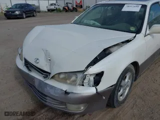1999 Lexus ES 300 Luxury Sport Sdn with VIN JT8BF28G5X0234597, listed as a IAAI auction lot 38527680 with NaN miles. Bid and sale history available at carsss.com. Image 6.