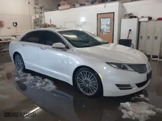 2014 Lincoln MKZ with VIN 3LN6L2J92ER836146, listed as a IAAI auction lot 41583343 with 130,613 mi miles. Bid and sale history available at carsss.com. Image 1.