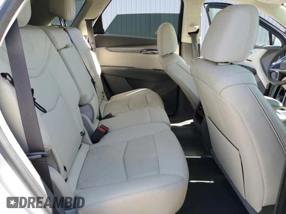 2021 Cadillac XT5 FWD Premium Luxury z VIN 1GYKNCRS2MZ209820, wystawiony jako Copart lot #51332565 z przebiegiem 52 916 mil mil oraz Szkoda całkowita • Salvage title. Historia ofert i sprzedaży dostępna na DreamBid. Obrazek 10.