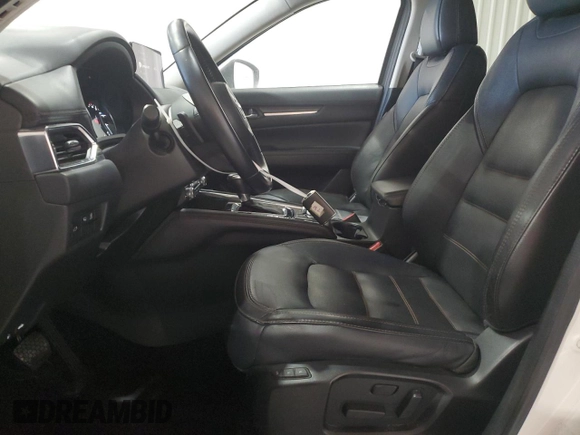 2021 Mazda CX-5 Grand Touring with VIN JM3KFBDM4M1344602, listed as a Copart auction lot 82793724 with 69,322 mi miles and Salvage Title. Bid and sale history available at carsss.com. Image 7.