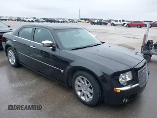 2005 Chrysler 300 with VIN 2C3AA63H45H674987, listed as a IAAI auction lot 41560730 with 101,659 mi miles. Bid and sale history available at carsss.com. Image 1.