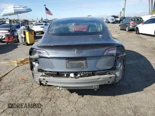 2023 Tesla Model 3 with VIN 5YJ3E1EA3PF541593, listed as a Copart auction lot 43926455 with 26,593 mi miles and Salvage title. Bid and sale history available at DreamBid. Image 6.