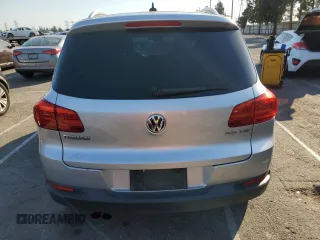 2013 Volkswagen Tiguan S with VIN WVGAV7AX8DW501081, listed as a Copart auction lot 88065365 with 157,312 mi miles and Salvage title. Bid and sale history available at DreamBid. Image 6.