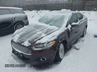2013 Ford Fusion SE Hybrid with VIN 3FA6P0LU1DR316619, listed as a IAAI auction lot 41515812 with 136,669 mi miles and . Bid and sale history available at carsss.com. Image 2.